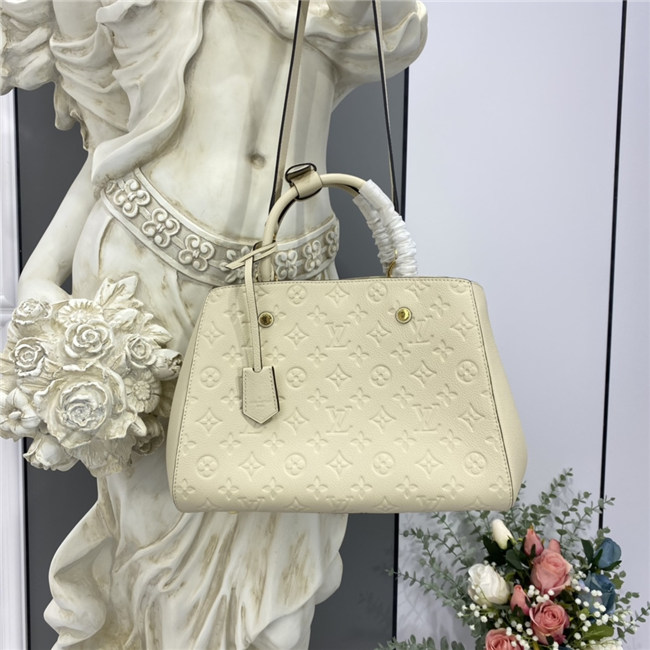 Louis Vuitton Montaigne MM Monogram Empreinte Leather New Creme Louis Vuitton Montaigne MM Monogram Empreinte Leather New Creme