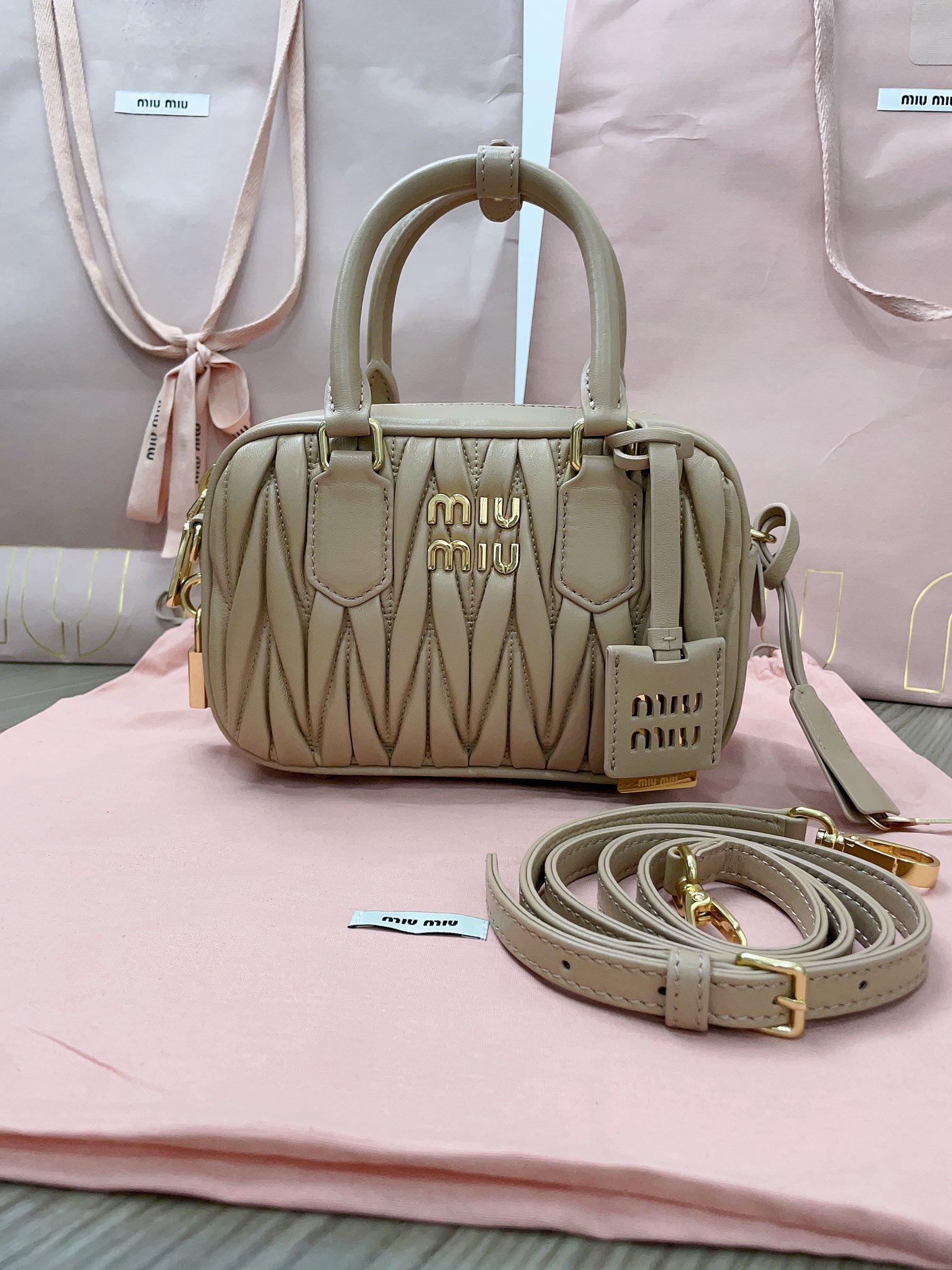 MIUMIU HANDBAG champagne color