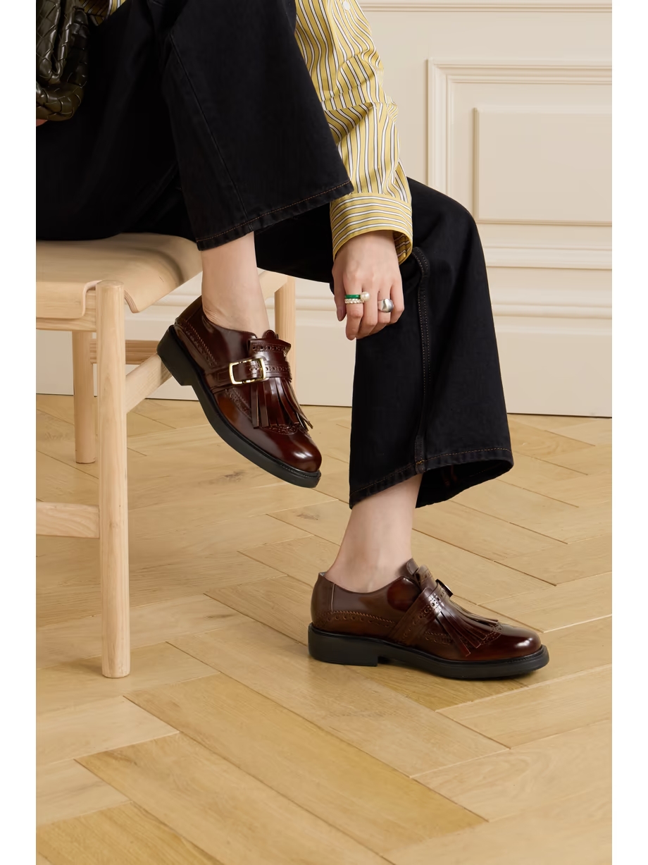 Fringed glossed-leather brogues