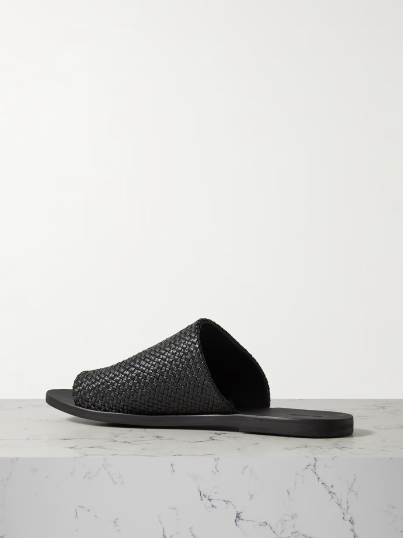 Asymmetric woven leather slides