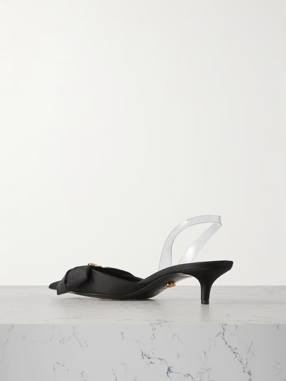 Medusa bow embellished rubber-trimmed satin slingback pumps