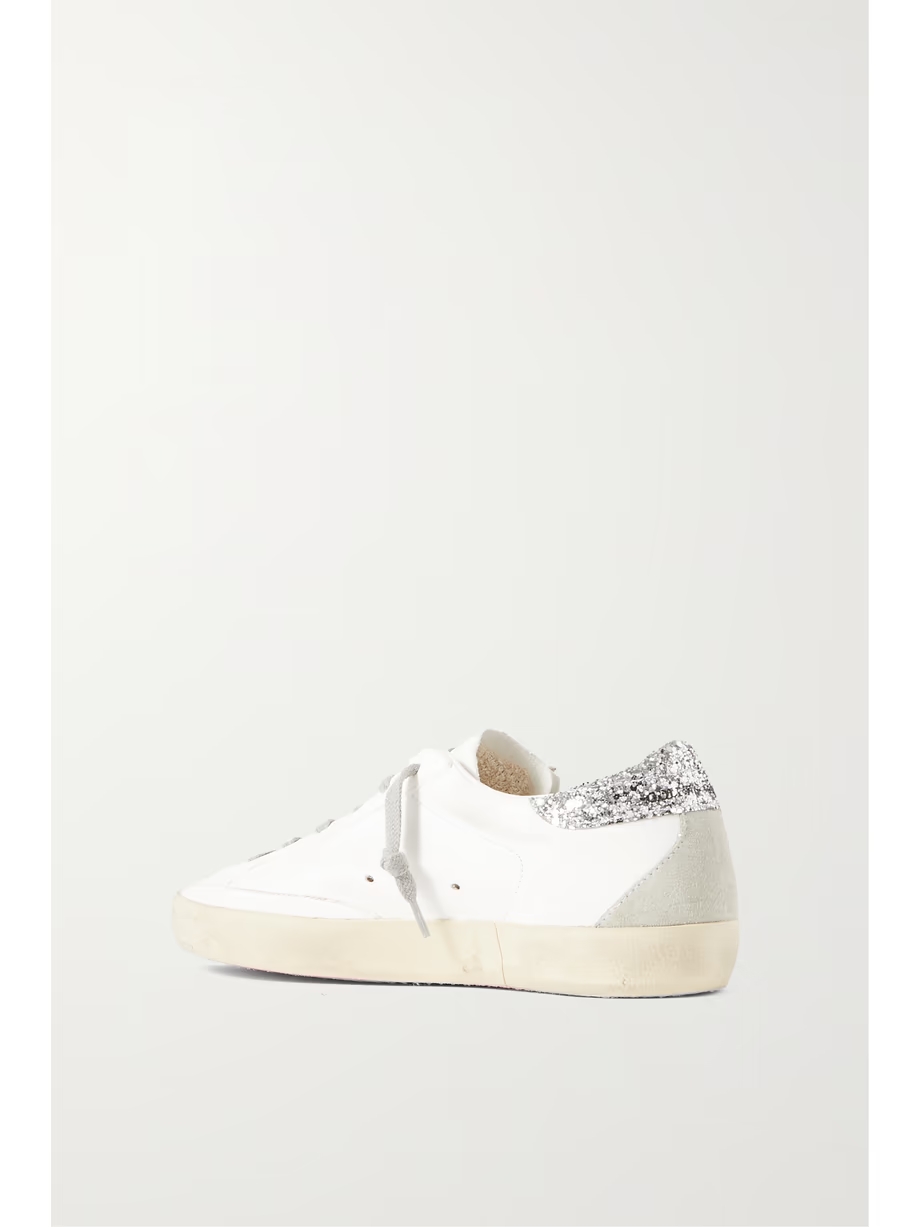 Superstar distressed denim-trimmed glittered leather sneakers