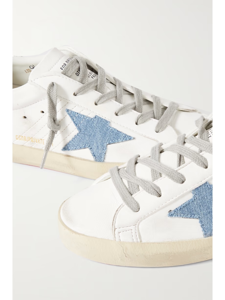 Superstar distressed denim-trimmed glittered leather sneakers